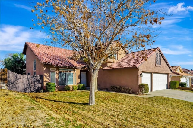 view of front facade with a front lawn and a garage