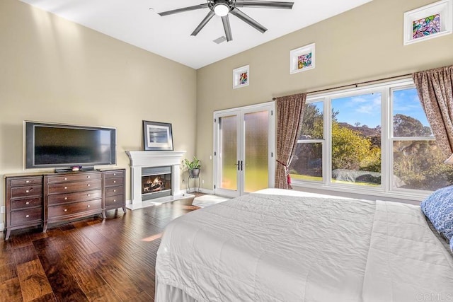 bedroom featuring dark wood-type flooring and ceiling fan