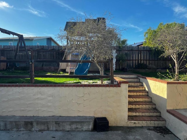 view of yard featuring a playground