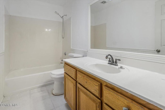 full bathroom featuring tile patterned floors, vanity, toilet, and tub / shower combination