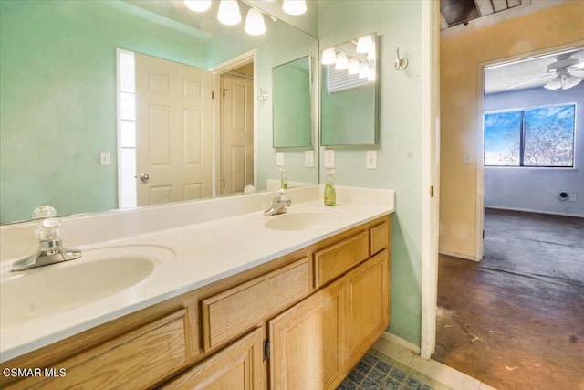 bathroom featuring tile patterned floors, ceiling fan, and vanity