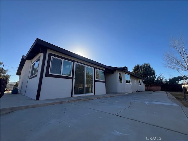 back of property with a patio area