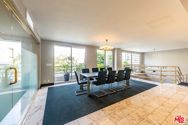 dining area with a chandelier