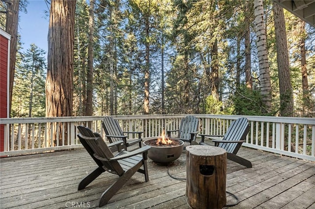 deck featuring a fire pit