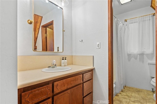 full bathroom featuring vanity, toilet, tile patterned flooring, and shower / bath combo