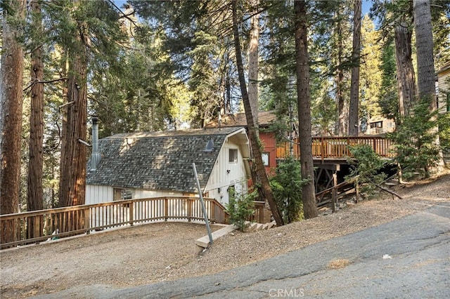 view of front of house with a wooden deck