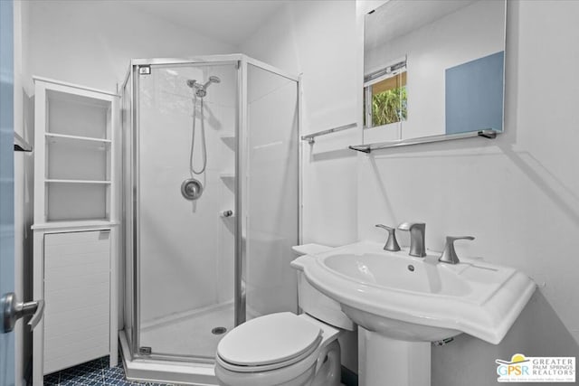 bathroom featuring sink, toilet, tile patterned flooring, and walk in shower