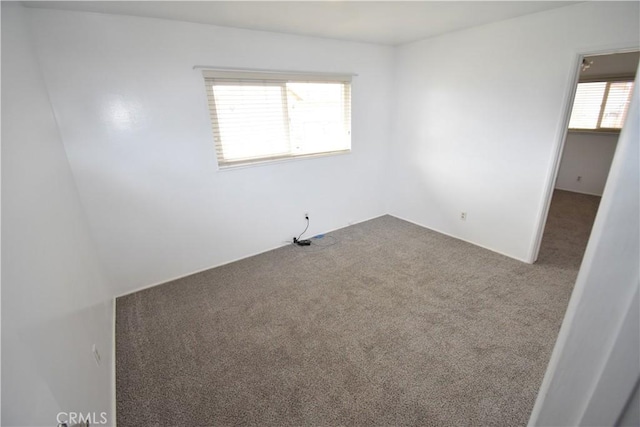 view of carpeted spare room