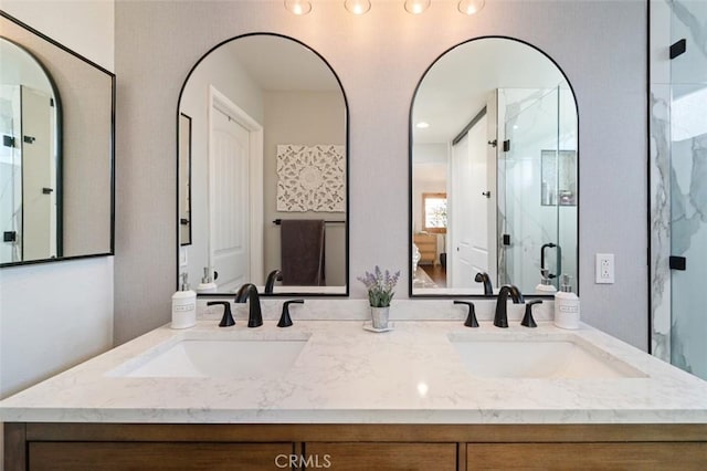 bathroom featuring vanity and walk in shower