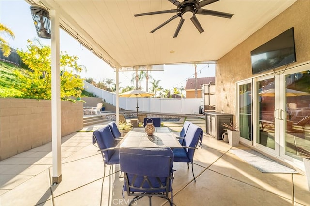 view of patio / terrace with ceiling fan and french doors