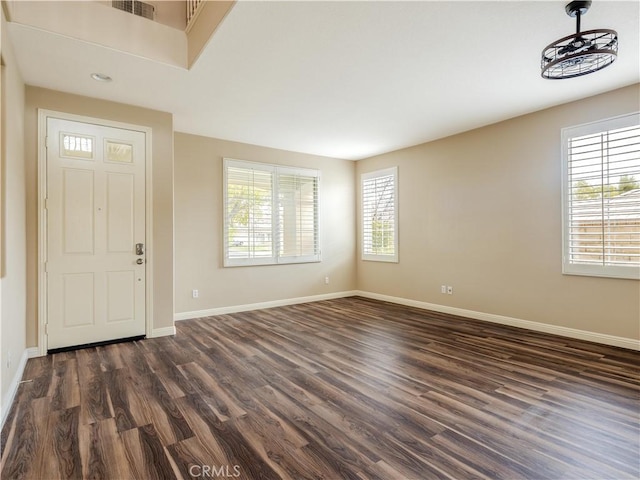 foyer with dark wood-type flooring