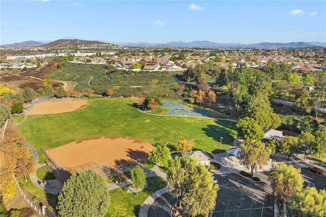 birds eye view of property featuring a mountain view