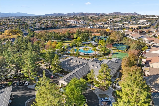 birds eye view of property featuring a mountain view