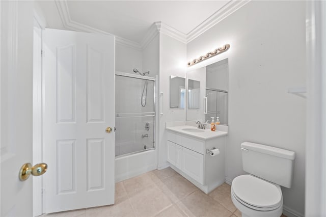 full bathroom with tile patterned flooring, enclosed tub / shower combo, crown molding, toilet, and vanity