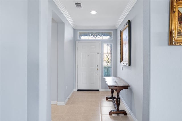 tiled entrance foyer with crown molding