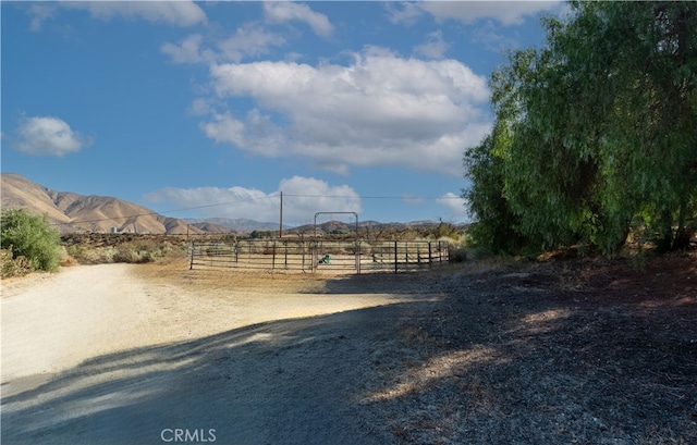 exterior space with a mountain view and a rural view