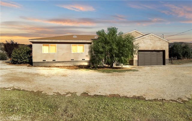 view of front of property with a garage