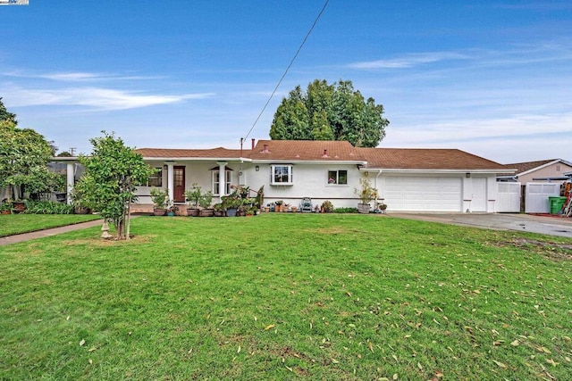 ranch-style house with a front yard and a garage