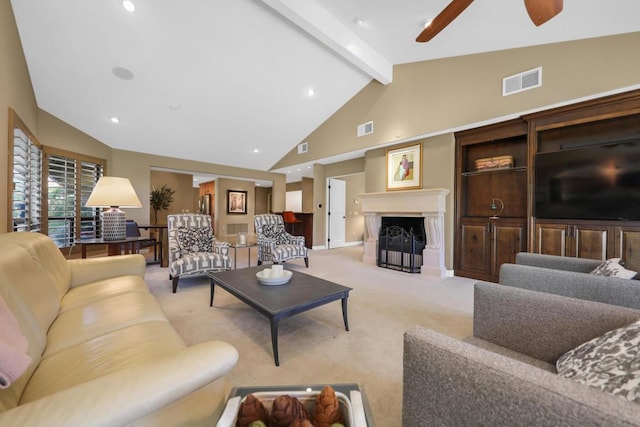 carpeted living room featuring beamed ceiling, ceiling fan, and high vaulted ceiling