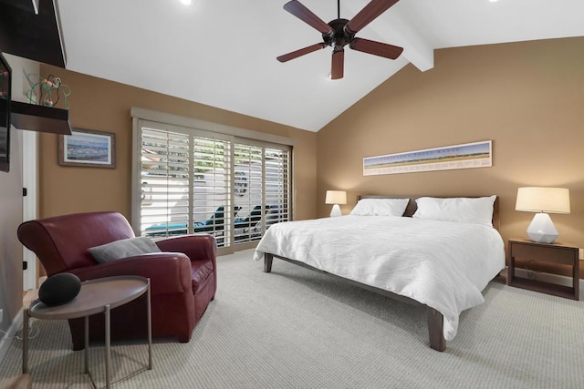 bedroom with carpet flooring, vaulted ceiling with beams, and ceiling fan