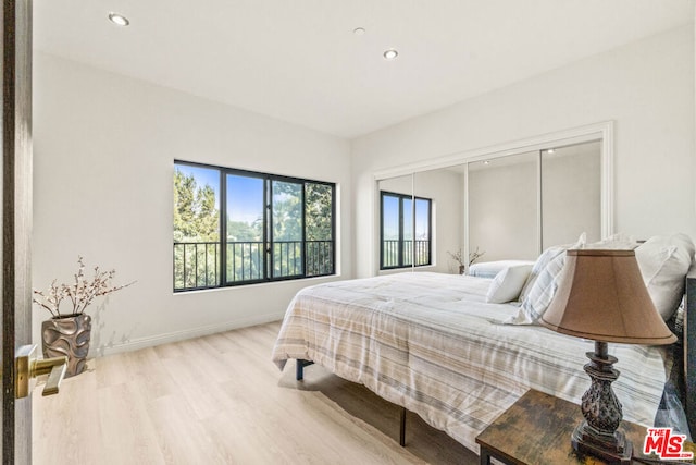 bedroom featuring light hardwood / wood-style floors