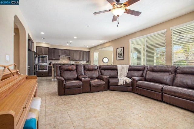 living room featuring ceiling fan