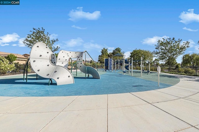 view of property's community featuring a playground