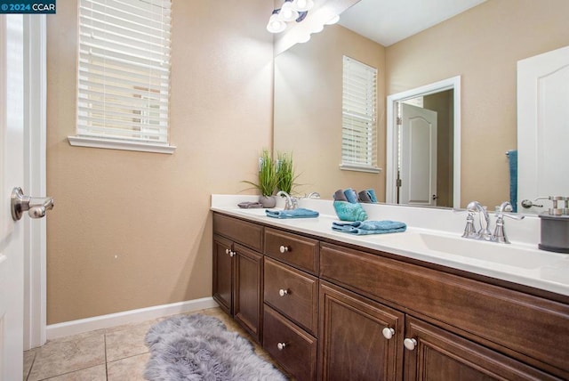 bathroom featuring tile patterned floors and vanity