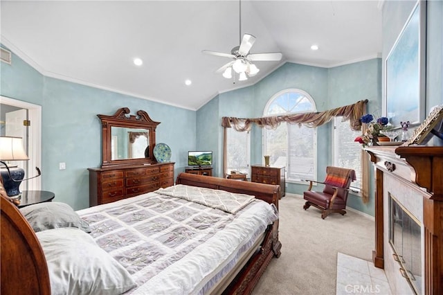 bedroom featuring light carpet, ceiling fan, and lofted ceiling