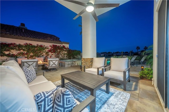 view of patio featuring outdoor lounge area and ceiling fan