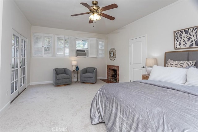 bedroom with cooling unit, ceiling fan, a fireplace, and carpet