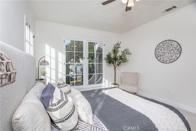 carpeted bedroom with french doors and ceiling fan