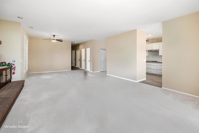 living room featuring ceiling fan