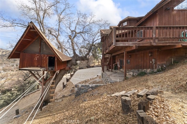 view of yard with a wooden deck