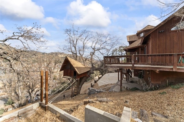 view of yard with a deck