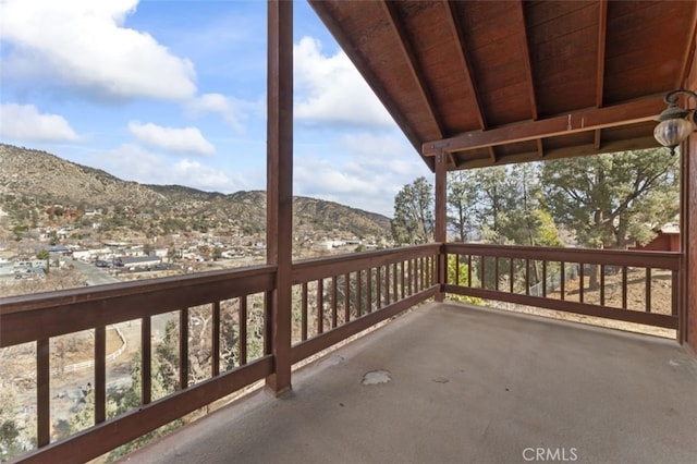 balcony featuring a mountain view