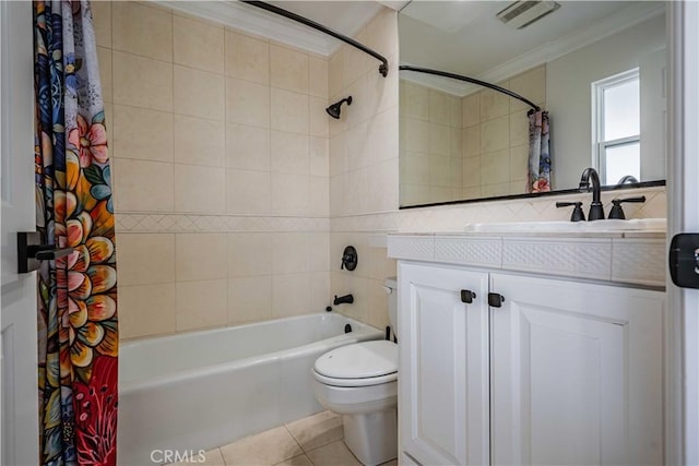 full bathroom featuring tile patterned flooring, crown molding, toilet, shower / bath combo with shower curtain, and vanity