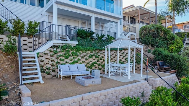 view of patio featuring an outdoor fire pit