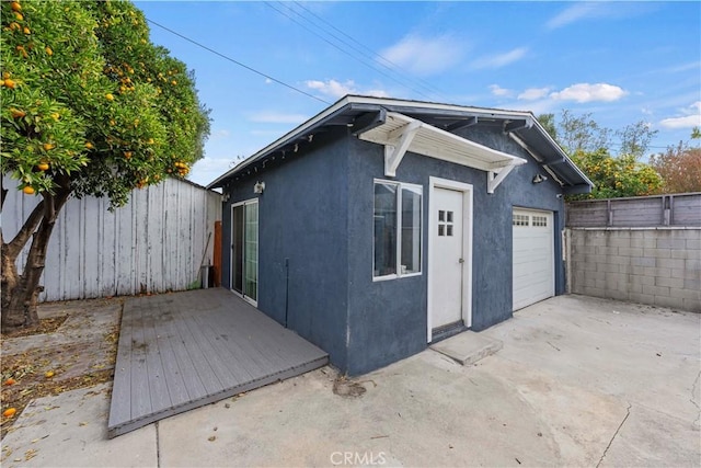 exterior space with a garage