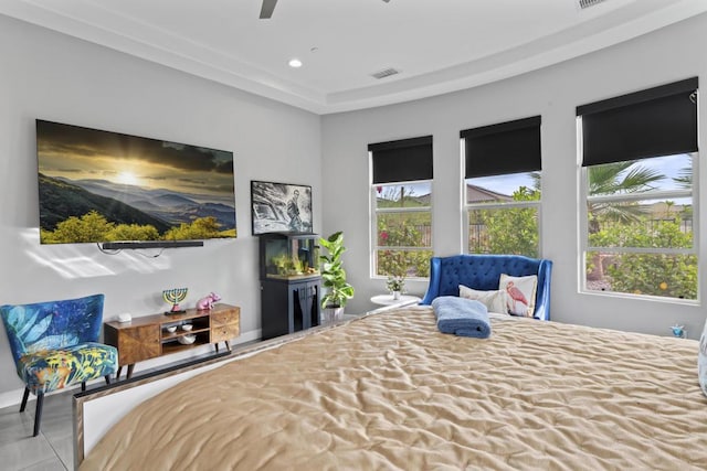 tiled bedroom with ceiling fan