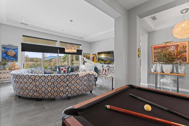 recreation room with an inviting chandelier and billiards