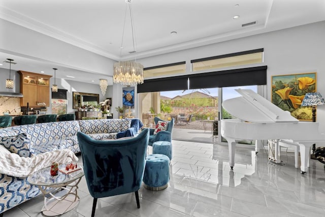 living room with a notable chandelier