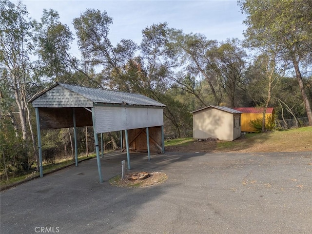 view of parking with a carport