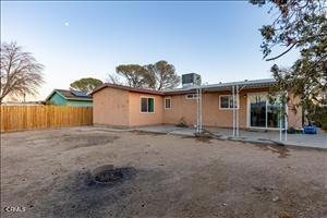 back of property featuring a patio