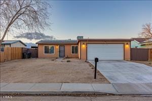 single story home featuring a garage