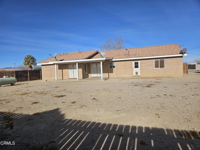 rear view of house with a patio area