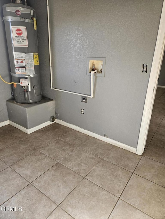 utility room with secured water heater