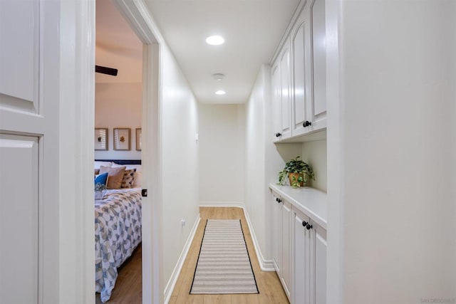 corridor featuring light wood-type flooring