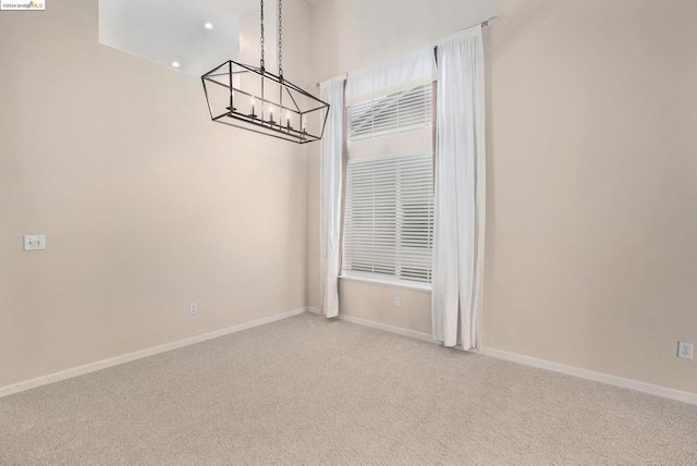 view of carpeted spare room