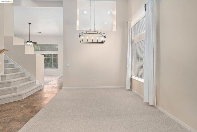 interior space featuring ceiling fan